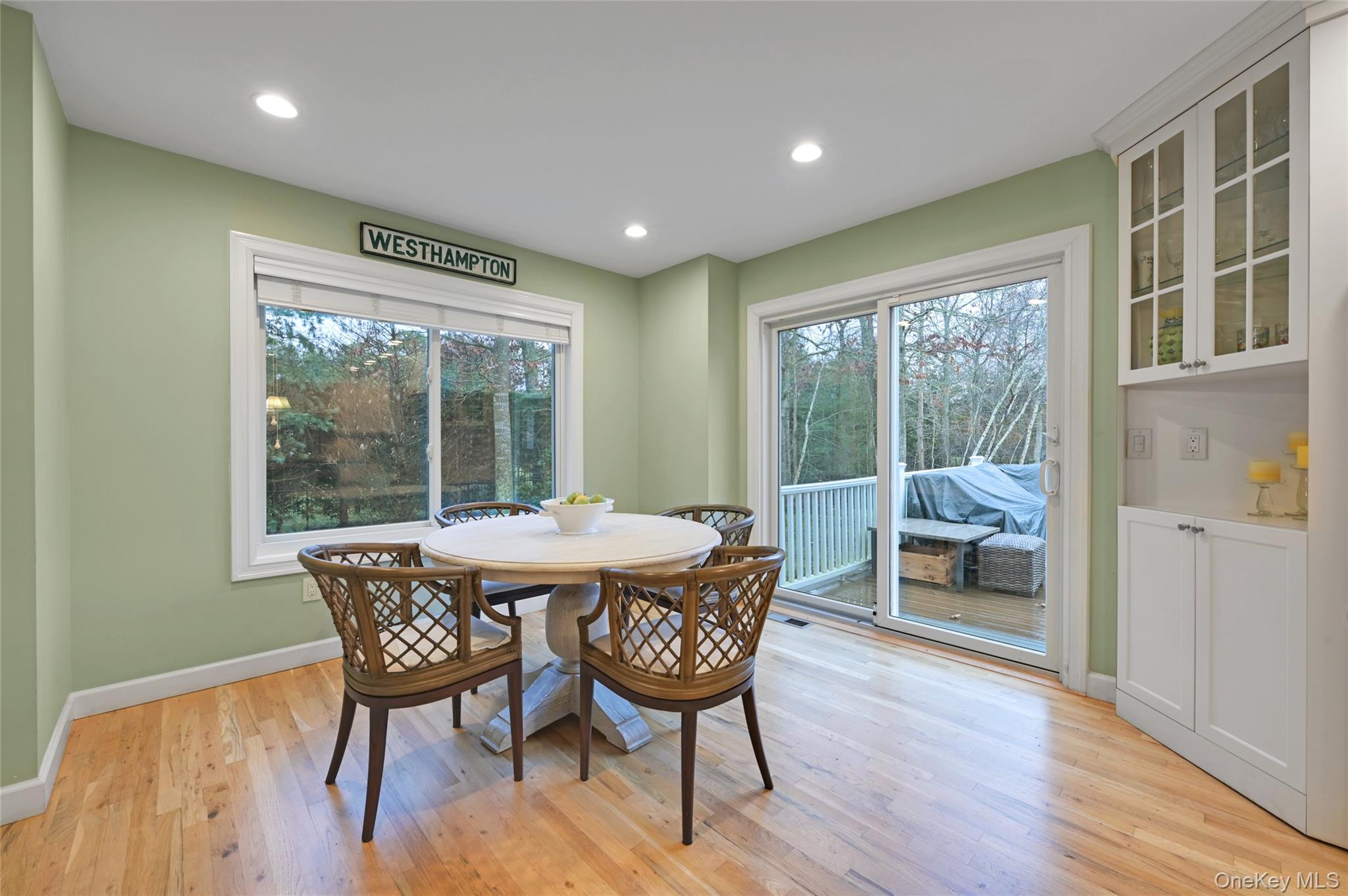 9 North Quarter Road Westhampton, NY 11977 - Photo 12 of 38 a dining room with furniture and wooden floor