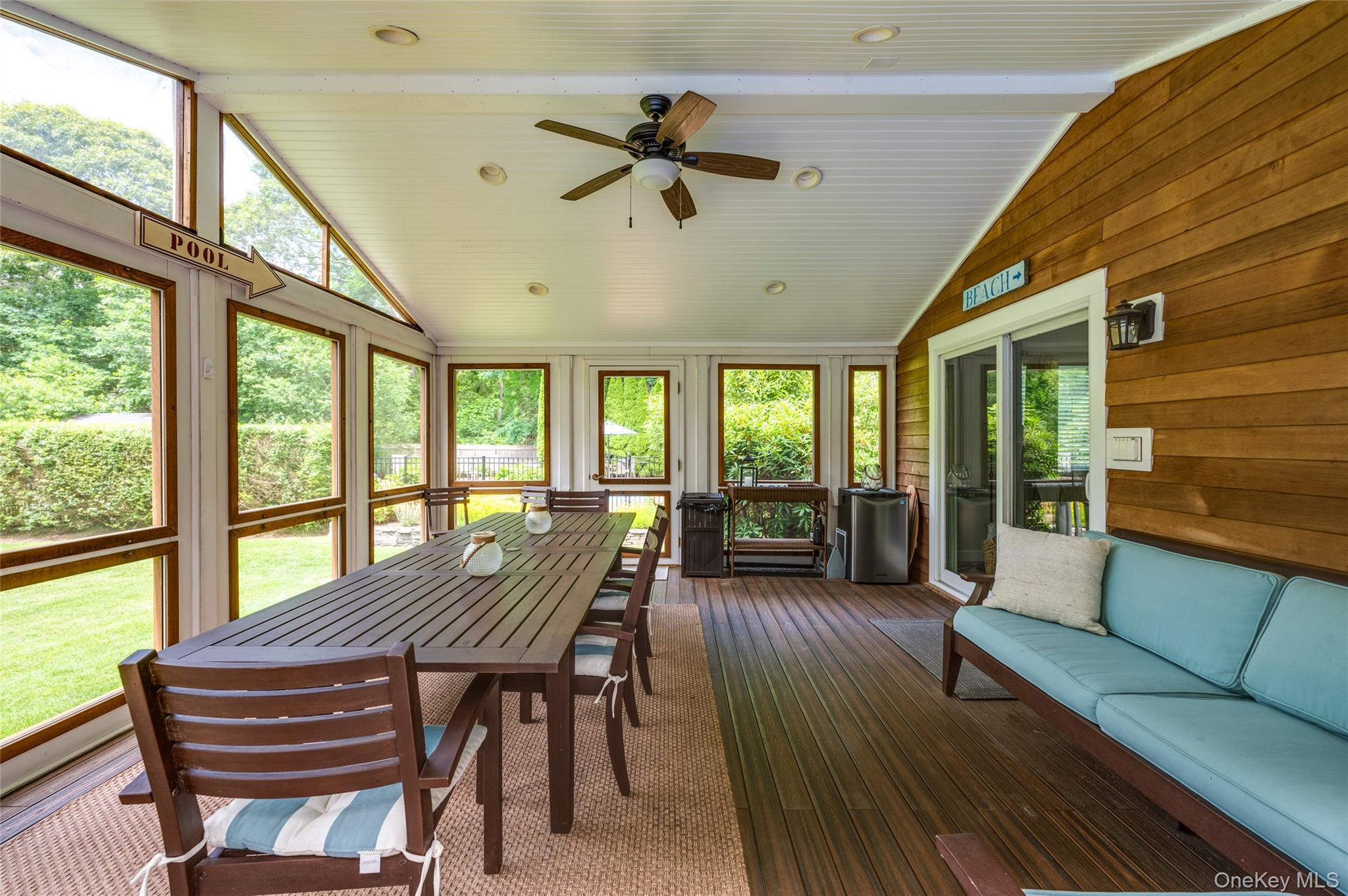 9 North Quarter Road Westhampton, NY 11977 - Photo 24 of 38 a view of a dining room with furniture window and outside view