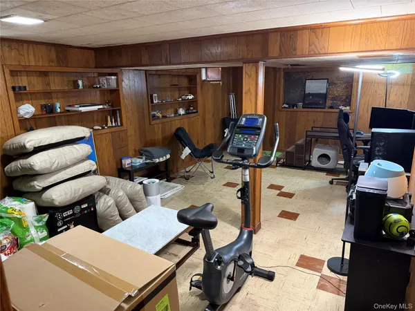 a view of a backyard with furniture