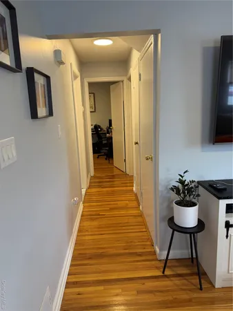 a bathroom with a sink toilet and mirror