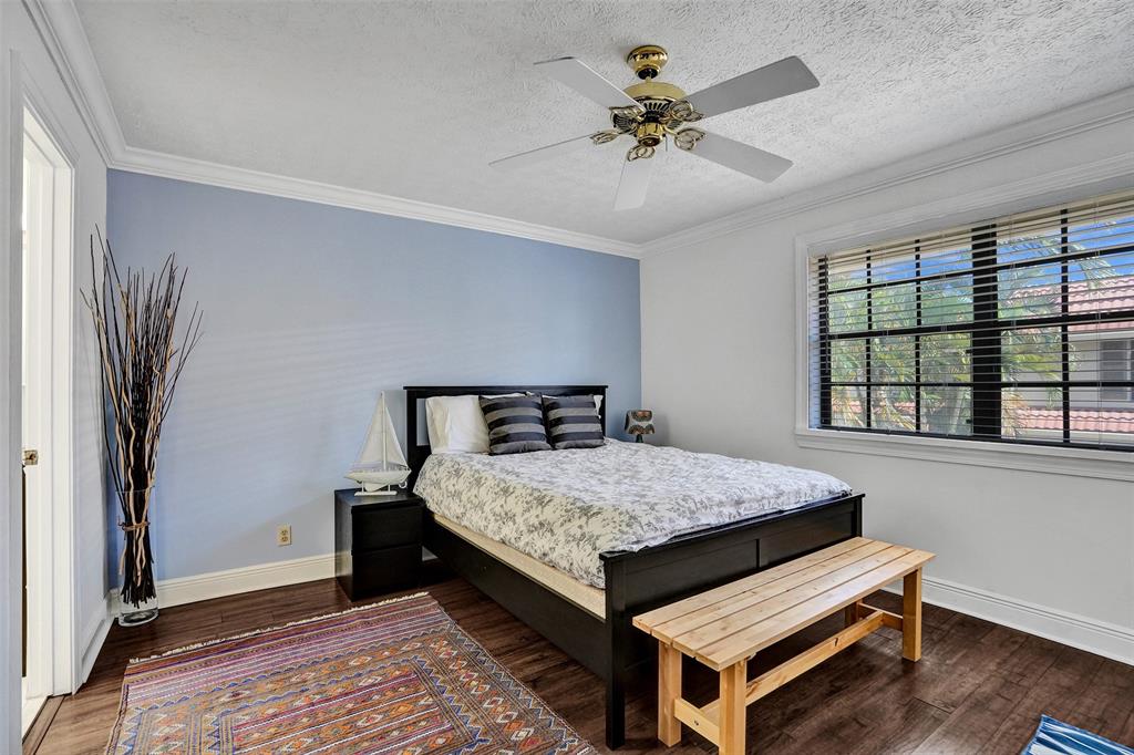 1415 Miami Road, Unit B Fort Lauderdale, FL 33316 - Photo 24 of 59 a bedroom with a bed and a window