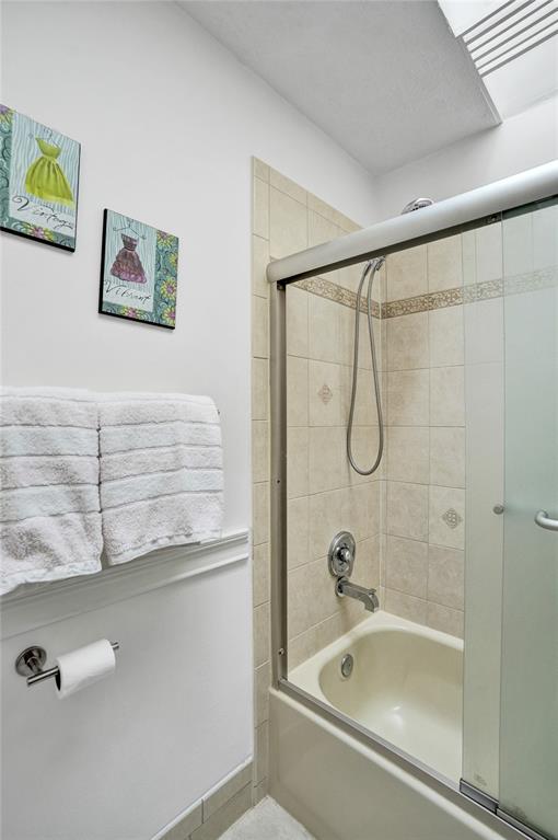 1415 Miami Road, Unit B Fort Lauderdale, FL 33316 - Photo 42 of 59 a bathroom with a tub and a shower
