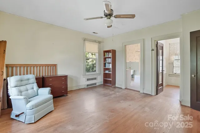 a view of livingroom with furniture and windows