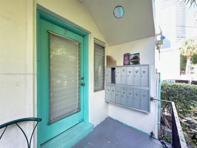 a bedroom with a large bed and a table