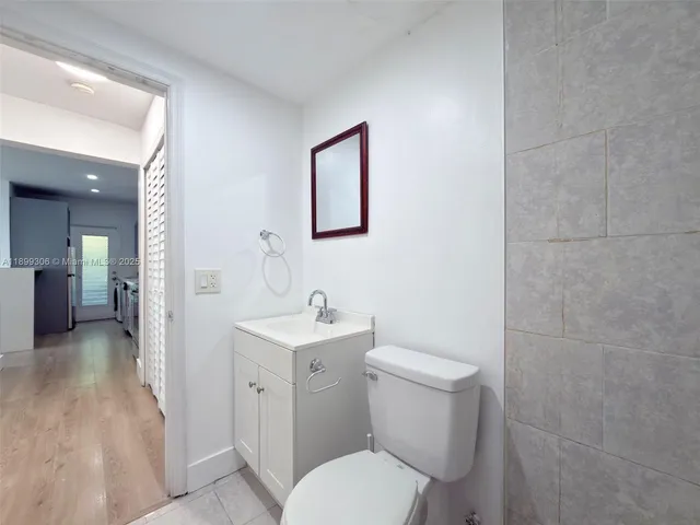 a view of a small space with wooden floor