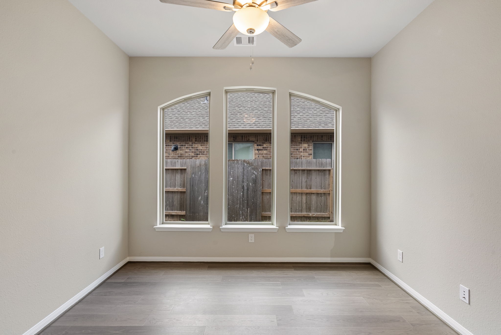 18807 Lima Orange Trail Manvel, TX 77578 - Photo 13 of 32 an empty room with a window