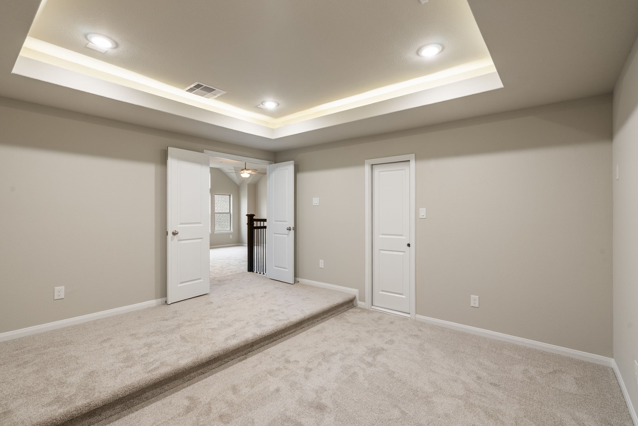 18807 Lima Orange Trail Manvel, TX 77578 - Photo 17 of 32 a view of a livingroom with wooden floor and kitchen space
