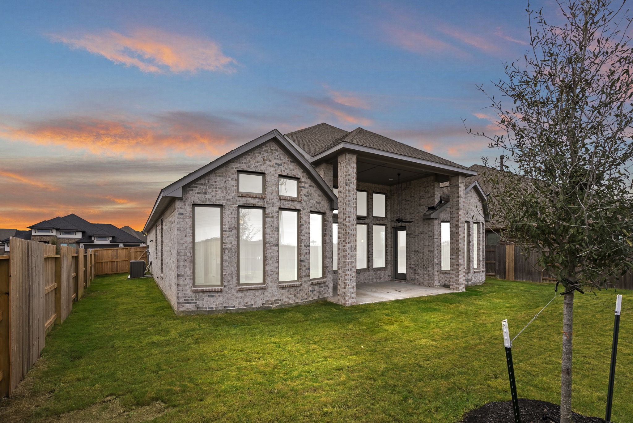 18807 Lima Orange Trail Manvel, TX 77578 - Photo 24 of 32 a front view of a house with garden