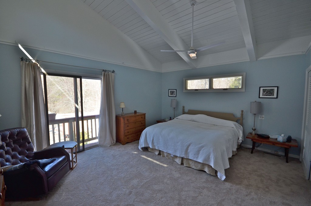 48 Meetinghouse Road Pelham, MA 01002 - Photo 20 of 30 a bedroom with a bed couch and a window