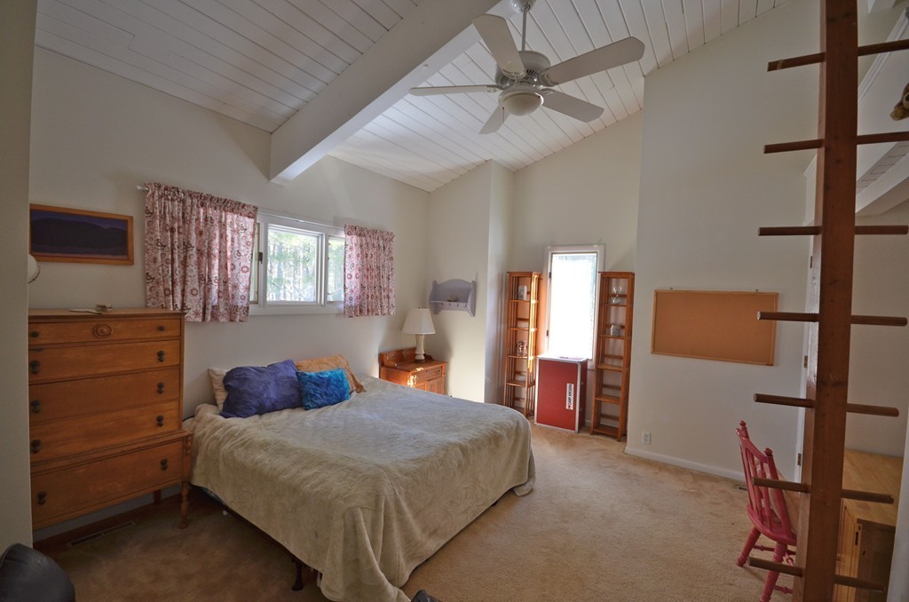 48 Meetinghouse Road Pelham, MA 01002 - Photo 23 of 30 a bedroom with a bed and a dresser