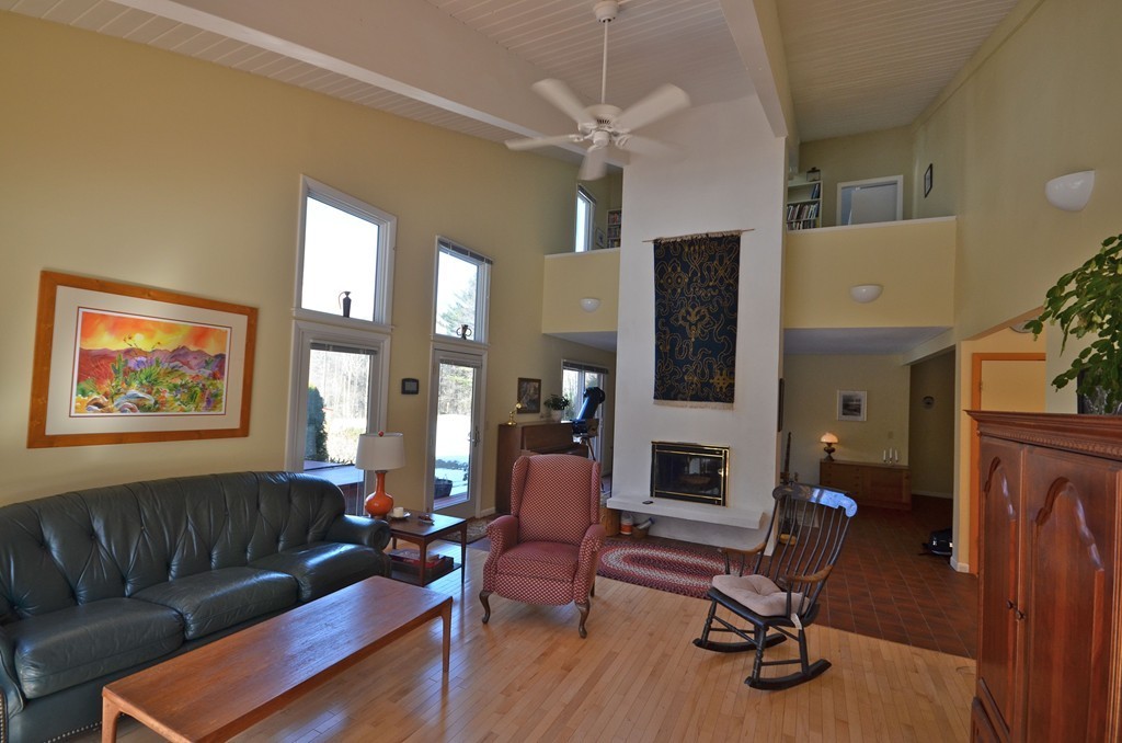 48 Meetinghouse Road Pelham, MA 01002 - Photo 3 of 30 a living room with furniture and wooden floor