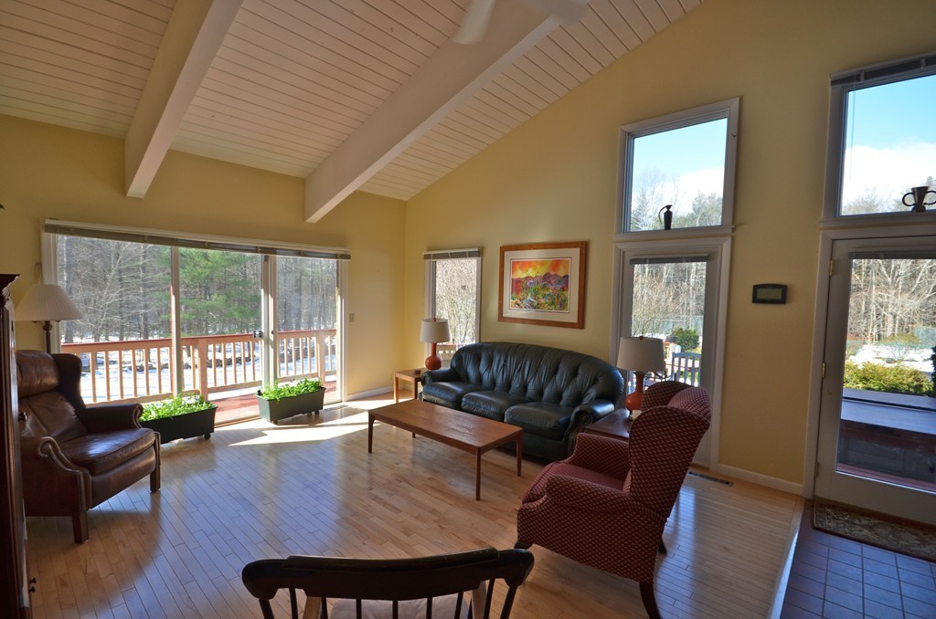 48 Meetinghouse Road Pelham, MA 01002 - Photo 4 of 30 a living room with furniture and a large window