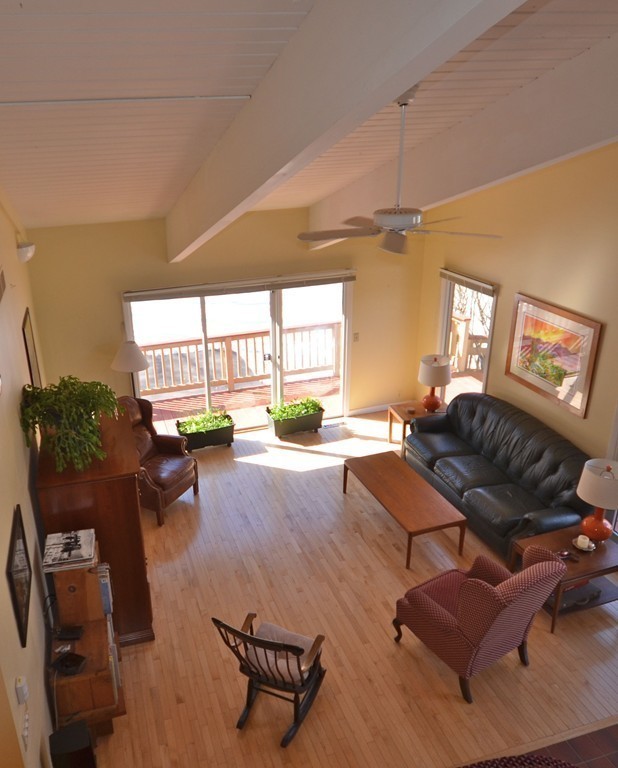 48 Meetinghouse Road Pelham, MA 01002 - Photo 9 of 30 a living room with furniture and a table