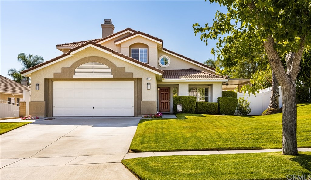 925 Cheyenne Road Corona, CA 92878 - Photo 1 of 1 a front view of a house with a yard