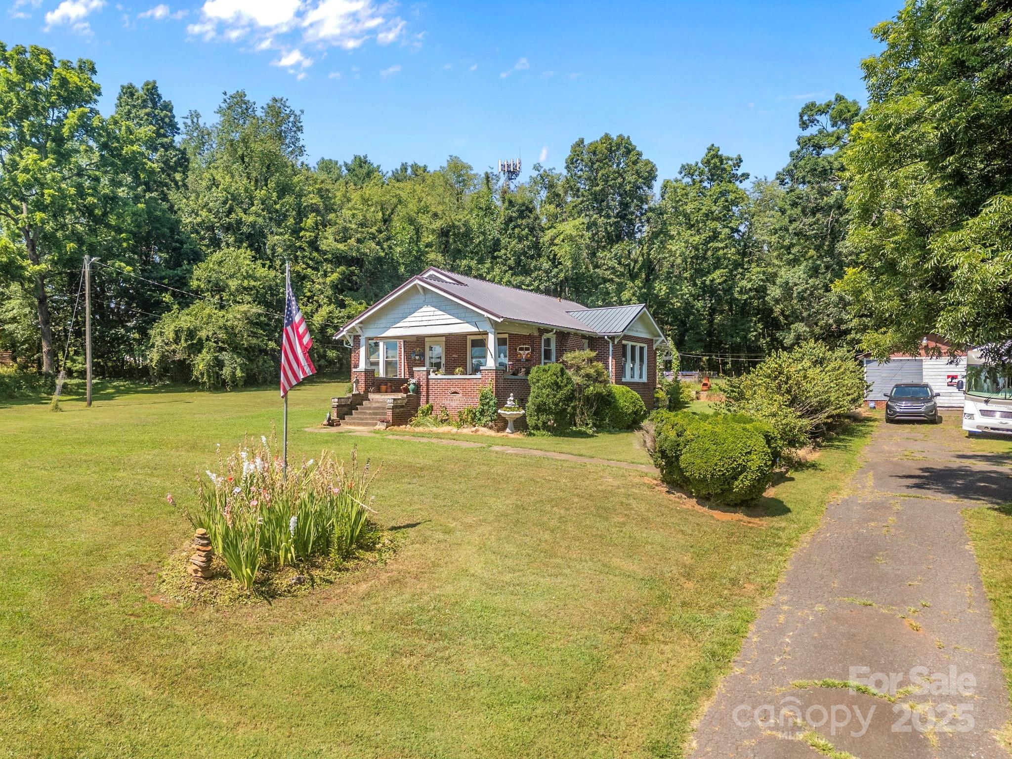 2401 Highway 181 Morganton, NC 28655 - Photo 17 of 17 a front view of a house with a yard