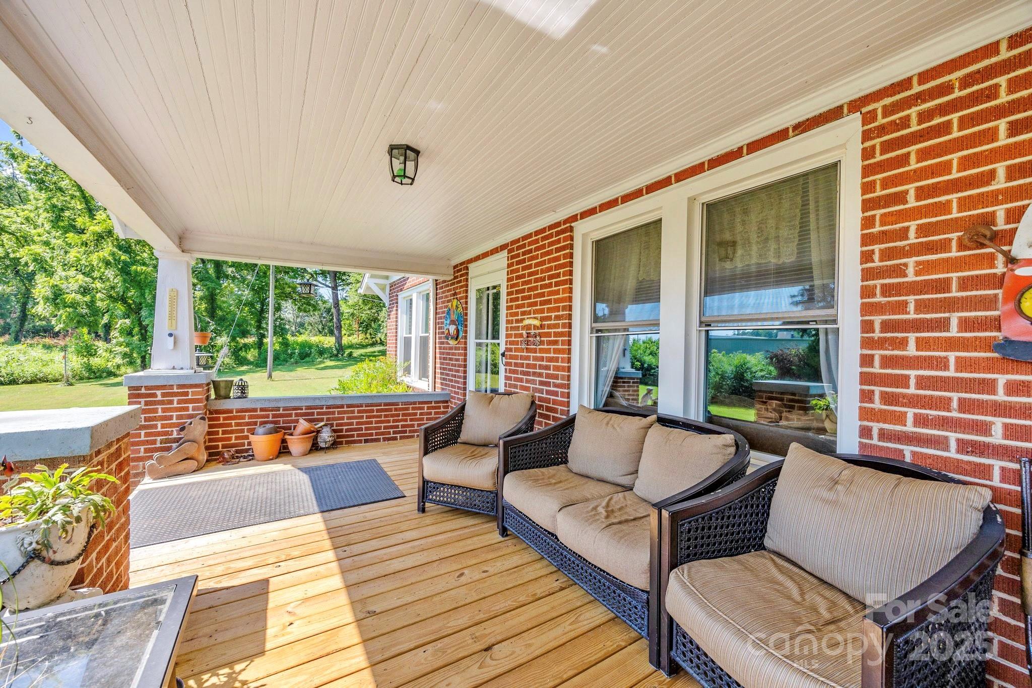 2401 Highway 181 Morganton, NC 28655 - Photo 3 of 17 a balcony with furniture and a potted plant