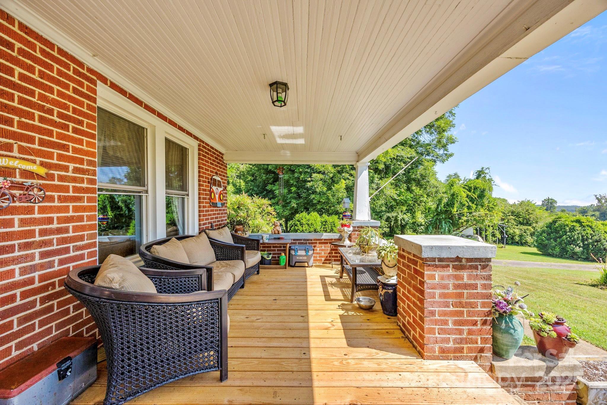 2401 Highway 181 Morganton, NC 28655 - Photo 4 of 17 a balcony with furniture and a potted plant