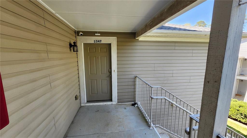 1347 Keys Crossing Drive Northeast Atlanta, GA 30319 - Photo 2 of 12 a view of a door and wooden floor