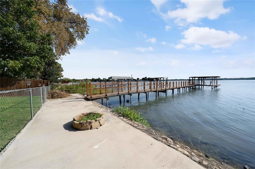 a view of a swimming pool with a lounge chair