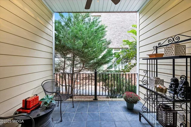 a view of front door of house and outdoor seating