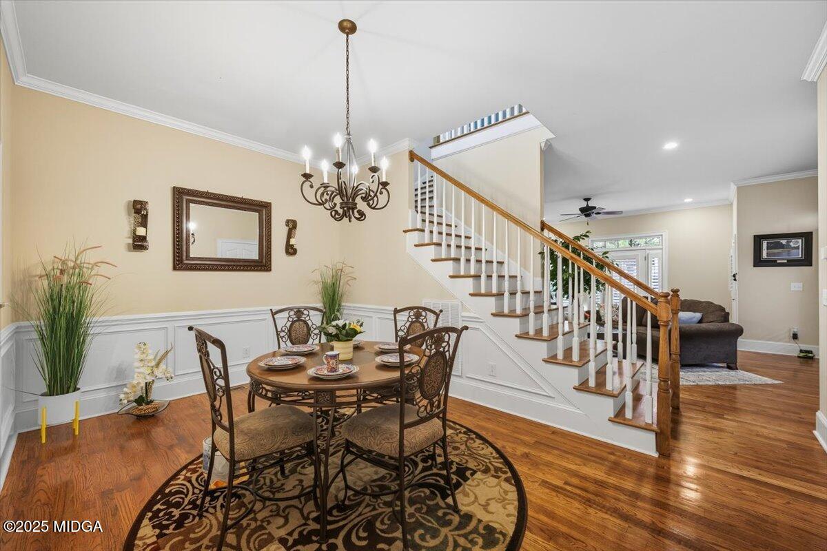 855 Tufthunter Macon, GA 31210 - Photo 14 of 38 a view of a dining room with furniture and wooden floor