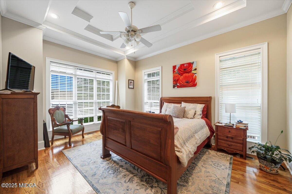 855 Tufthunter Macon, GA 31210 - Photo 18 of 38 a spacious bedroom with a bed and glass window