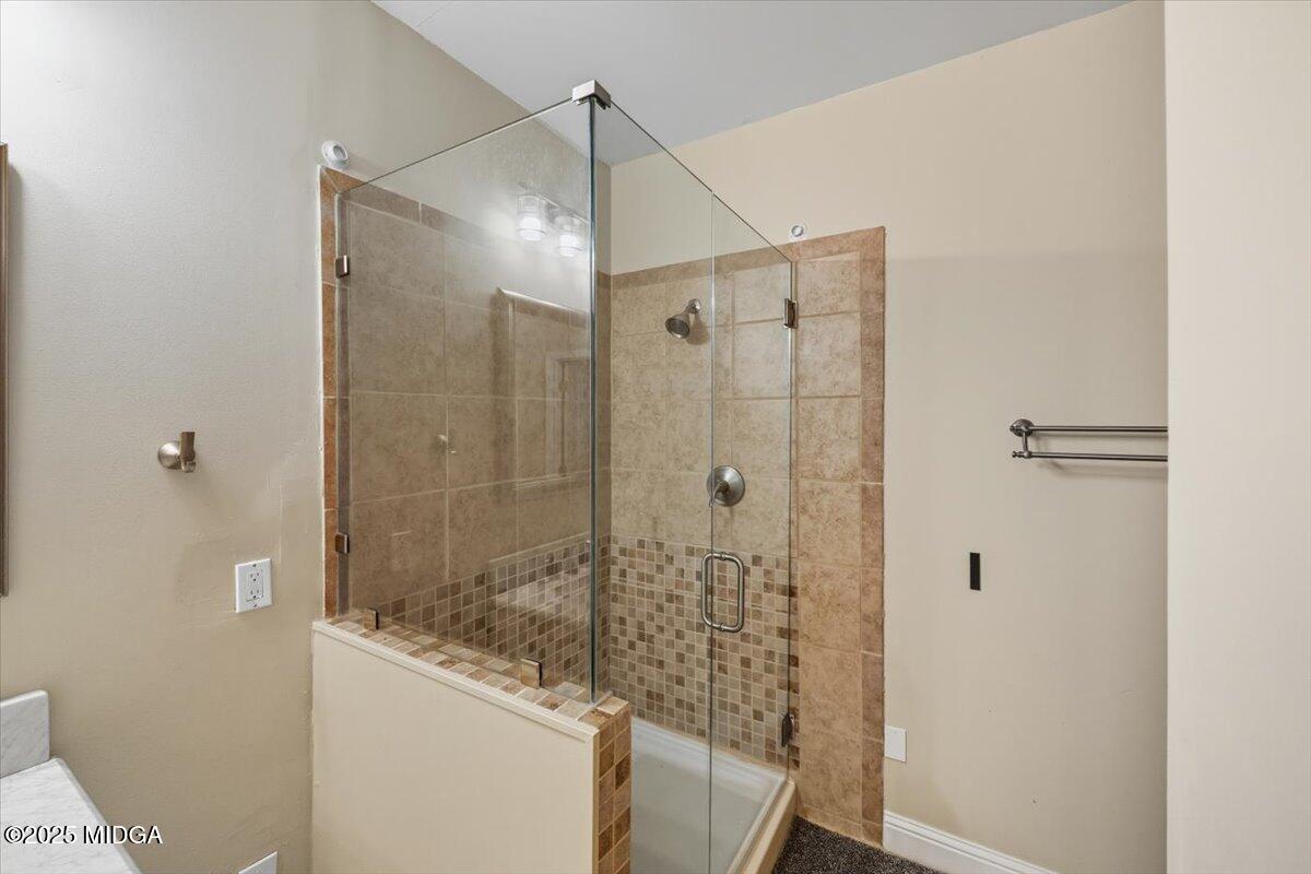 855 Tufthunter Macon, GA 31210 - Photo 32 of 38 a bathroom with a shower and a sink