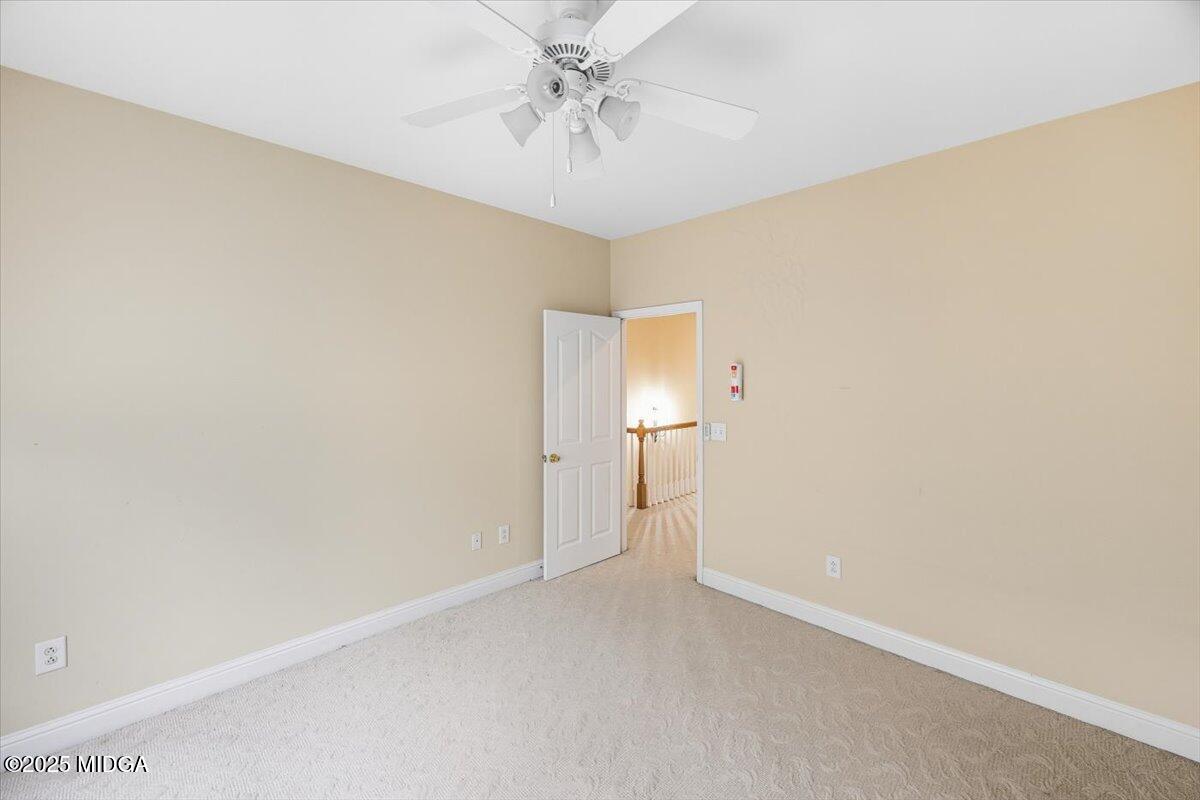 855 Tufthunter Macon, GA 31210 - Photo 36 of 38 a view of a room with a ceiling fan and entryway