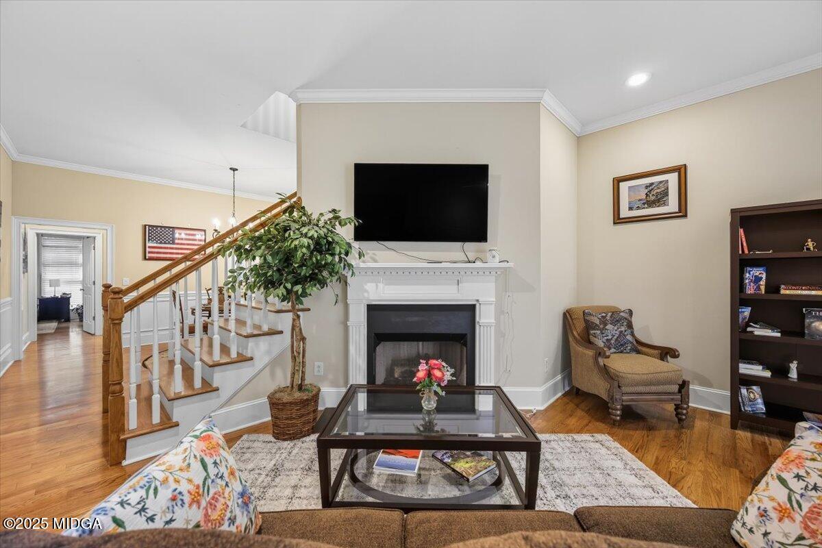 855 Tufthunter Macon, GA 31210 - Photo 7 of 38 a living room with furniture a rug and a fireplace
