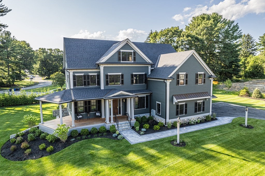 7 Tuttle Lane Lynnfield, MA 01940 - Photo 2 of 5 a front view of house with yard and green space