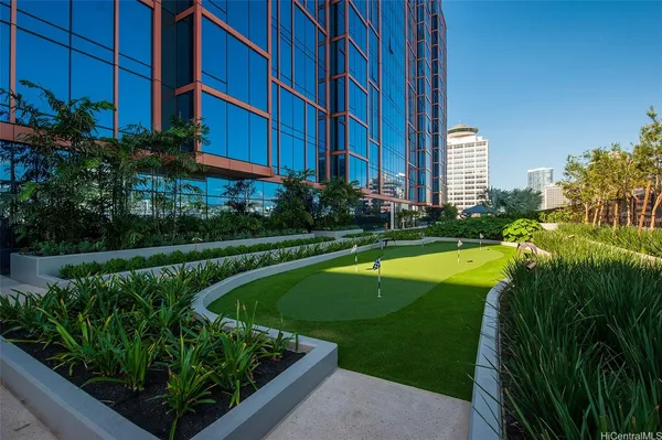 a view of a swimming pool with a garden