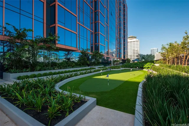 a view of a swimming pool with a garden