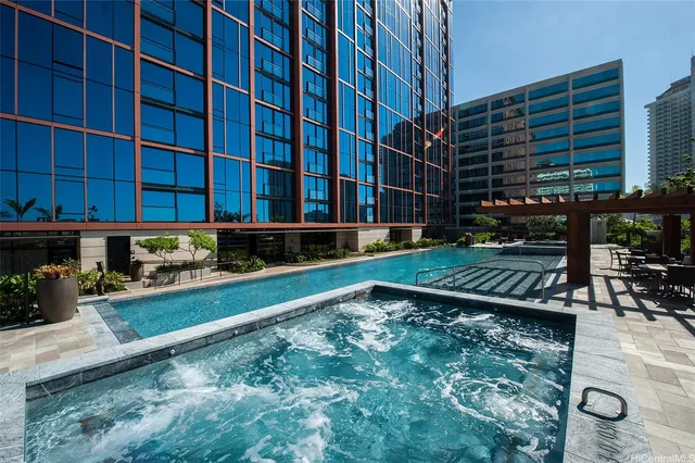 a front view of building with yard