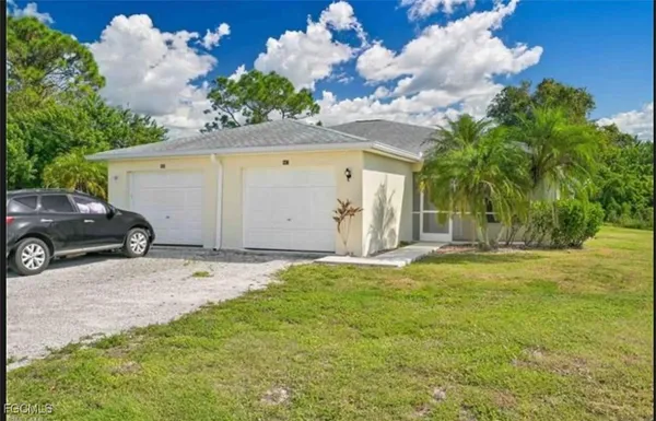 $394,900 | 465-467 Lillon Avenue South, Lehigh Acres, FL 33974