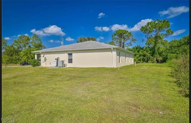 $394,900 | 465-467 Lillon Avenue South, Lehigh Acres, FL 33974