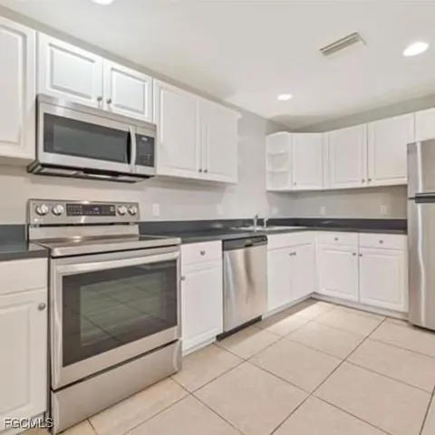 $394,900 | 465-467 Lillon Avenue South, Lehigh Acres, FL 33974