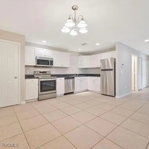 $394,900 | 465-467 Lillon Avenue South, Lehigh Acres, FL 33974