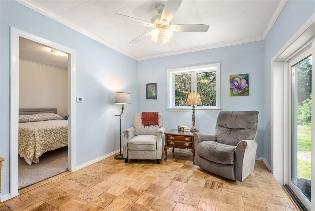 87 R Ruggles Street Gilbertville, MA 01031 - Photo 15 of 39 a bedroom with furniture and a large window