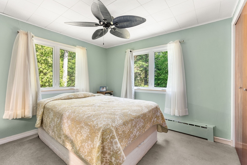 87 R Ruggles Street Gilbertville, MA 01031 - Photo 19 of 39 a bedroom with a bed and a window