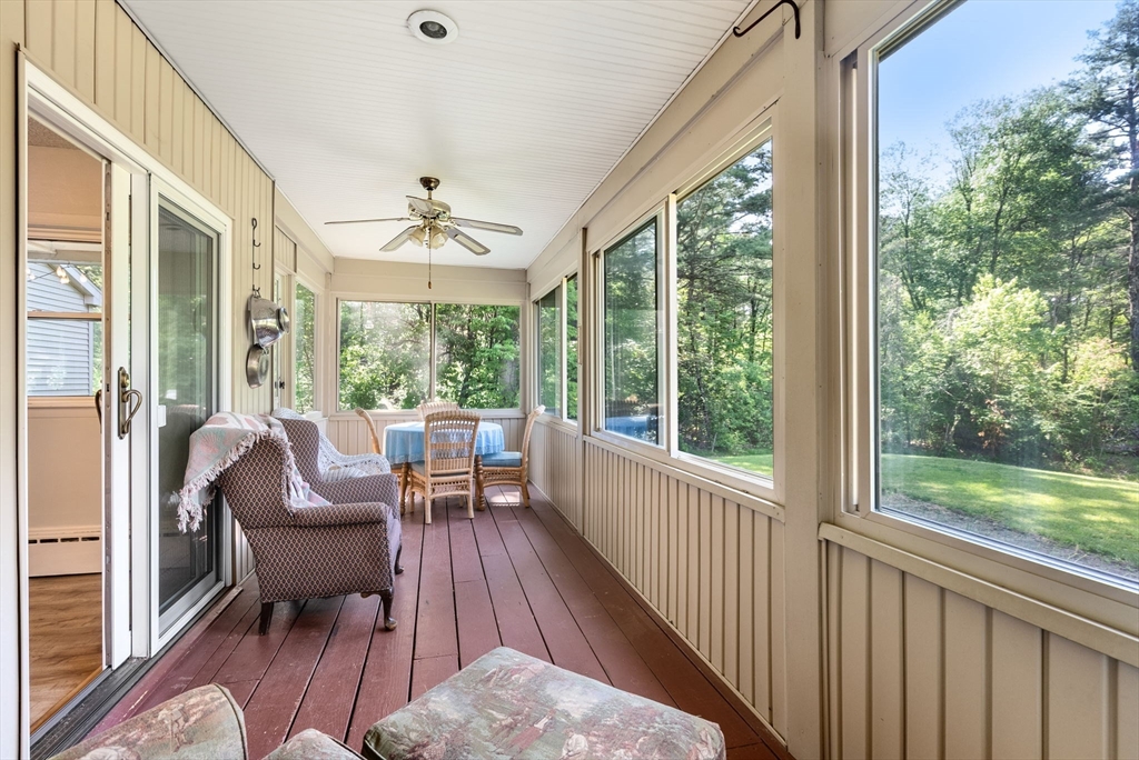 87 R Ruggles Street Gilbertville, MA 01031 - Photo 25 of 39 a view of a porch with furniture and a yard