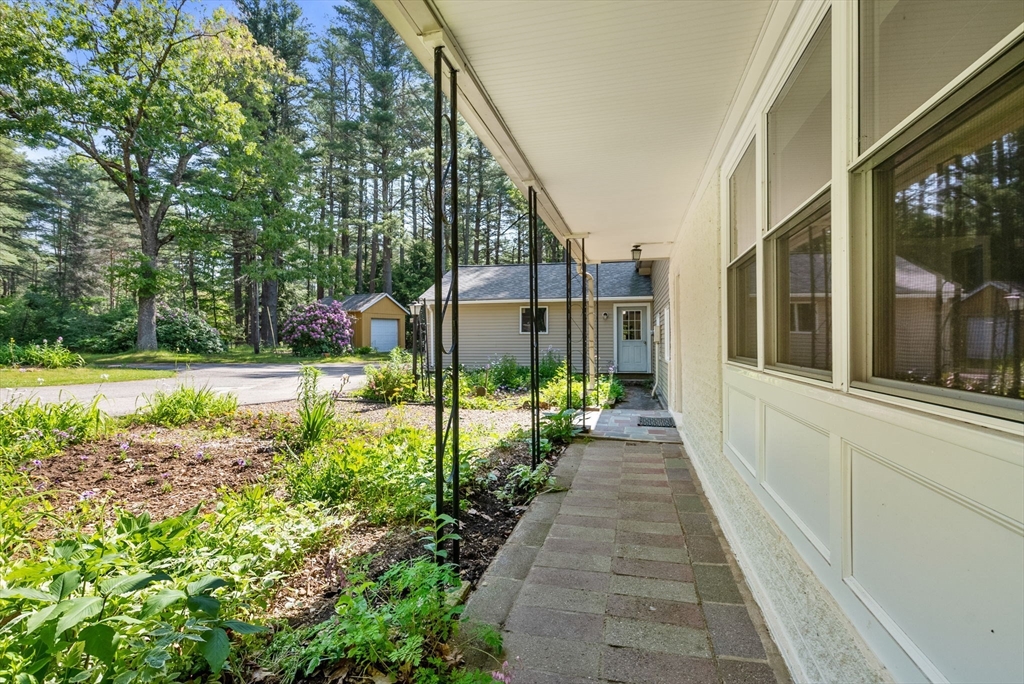 87 R Ruggles Street Gilbertville, MA 01031 - Photo 3 of 39 a view of a pathway both side of the house