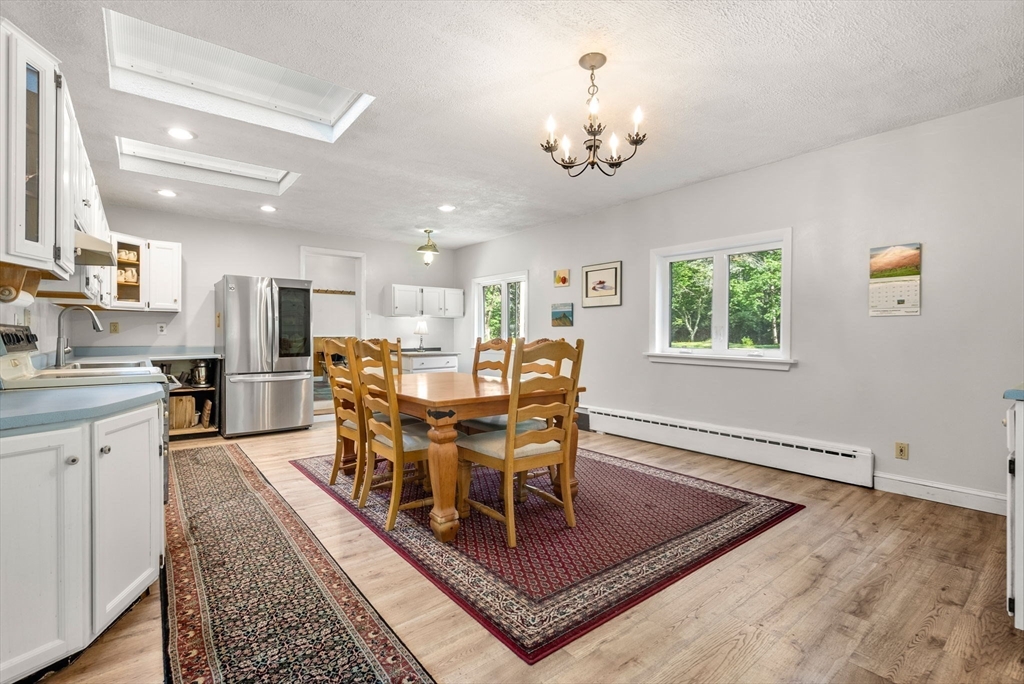 87 R Ruggles Street Gilbertville, MA 01031 - Photo 9 of 39 a view of a dining room with furniture
