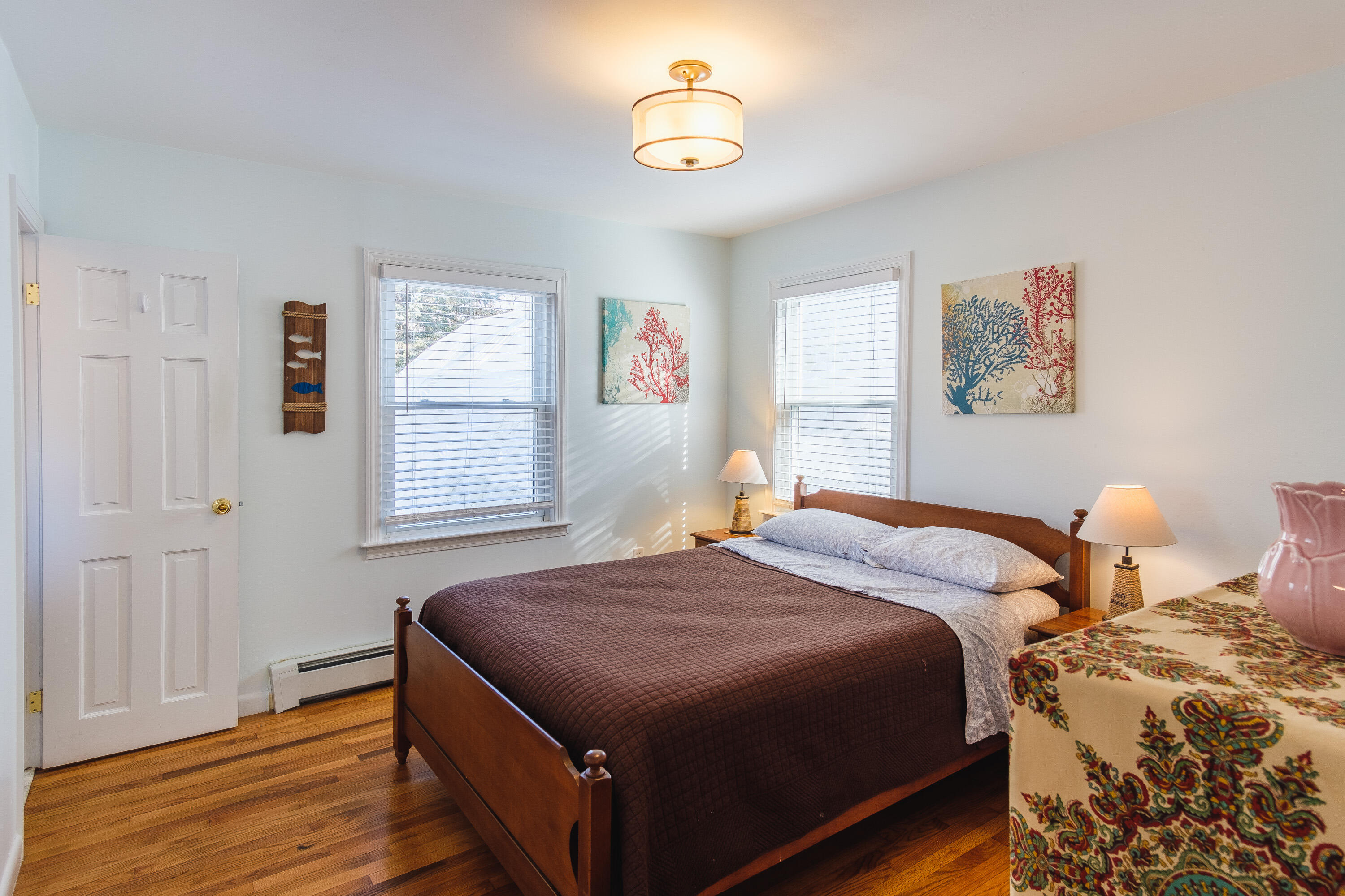 2 Huettner Road Woods Hole, MA 02543 - Photo 11 of 20 a bedroom with two beds and a window