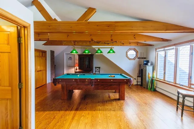 a living room with furniture and a table