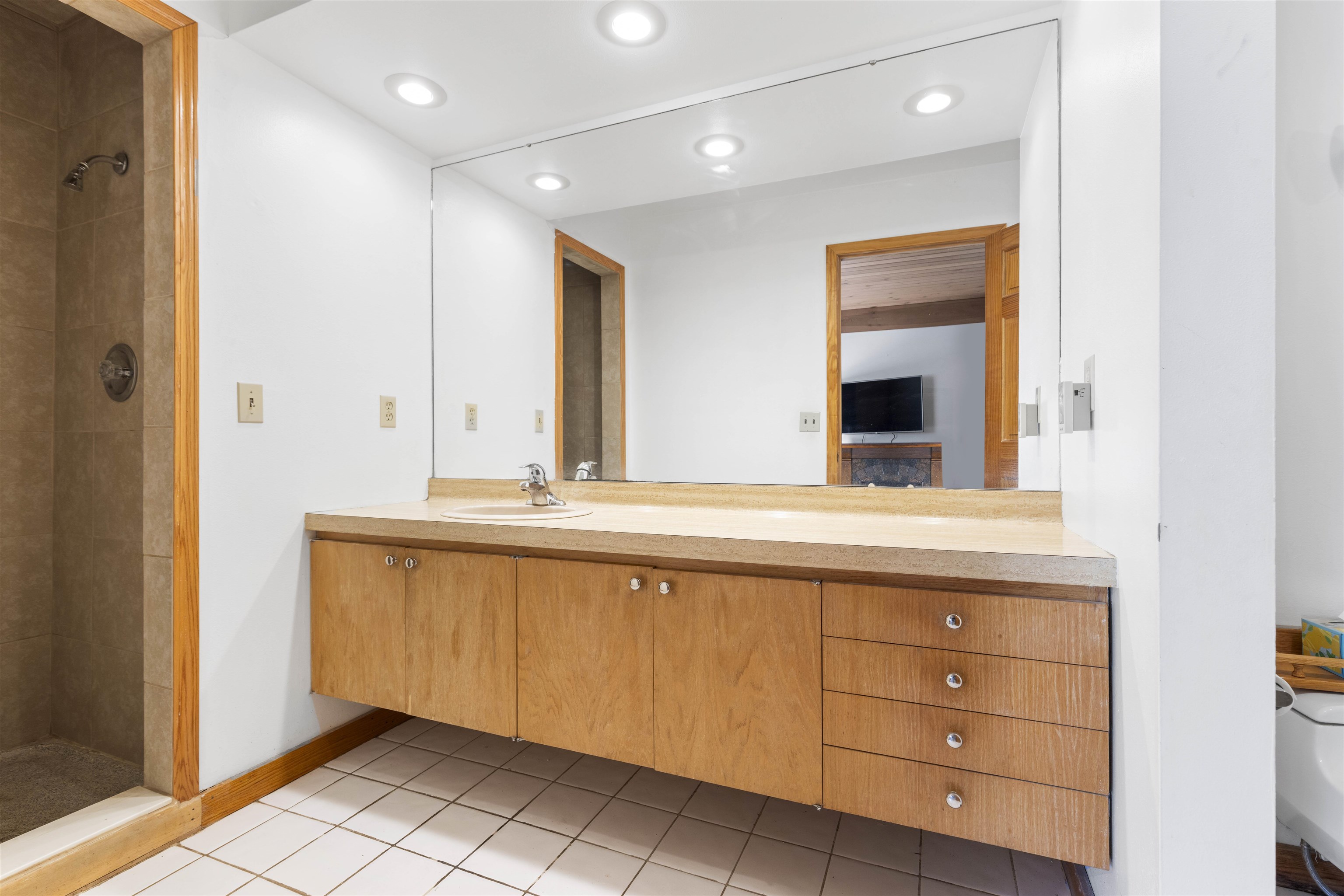 4969 Brookview Road Rockford, IL 61107 - Photo 21 of 34 a bathroom with a sink and a mirror