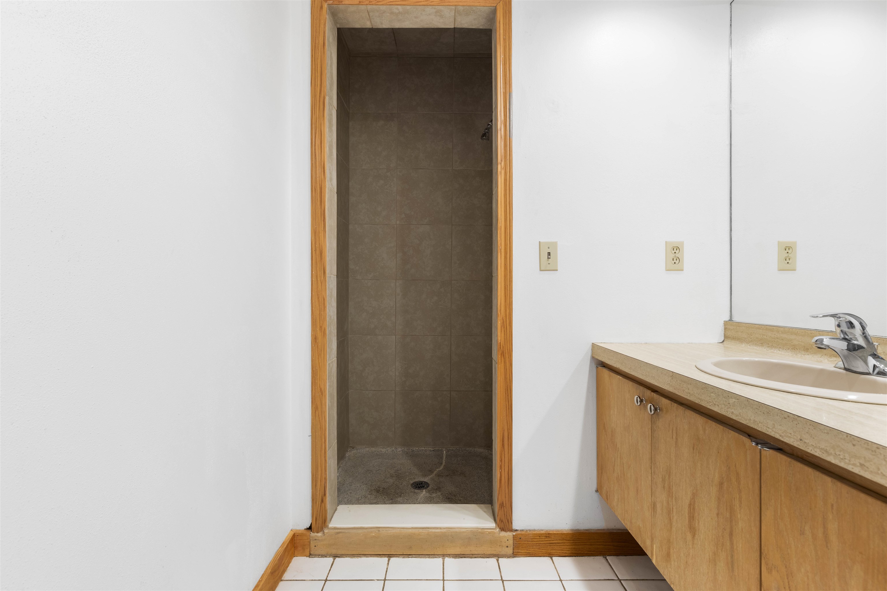 4969 Brookview Road Rockford, IL 61107 - Photo 22 of 34 a bathroom with a sink and a mirror