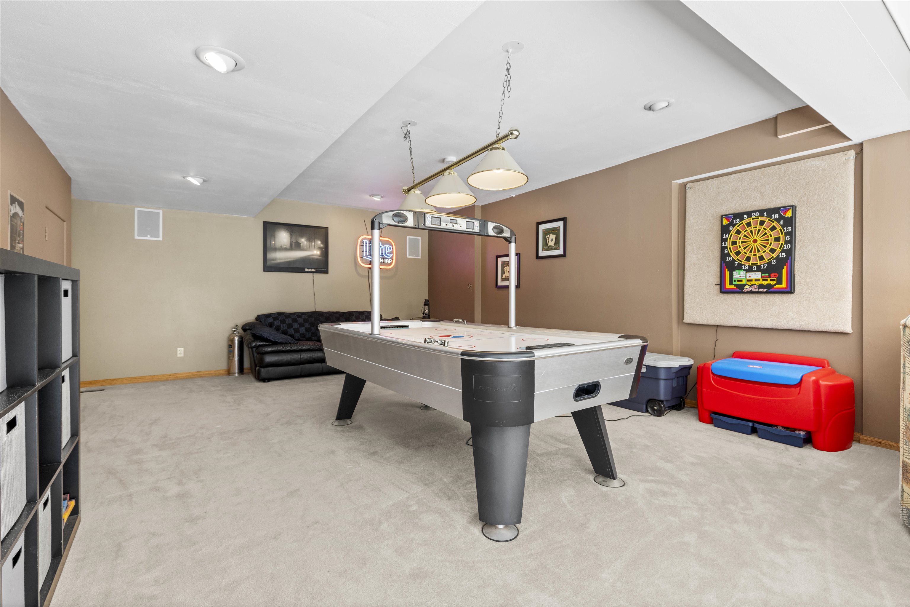 4969 Brookview Road Rockford, IL 61107 - Photo 23 of 34 a living room with furniture pool table and wall paintings
