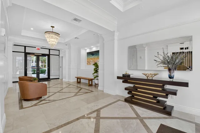 a view of a house with fountain and entertaining space