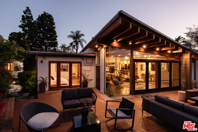 a view of a street with a building in the background