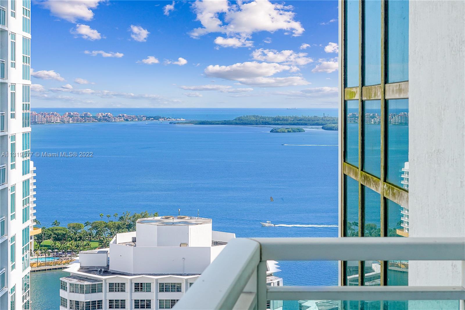 a view of balcony with furniture